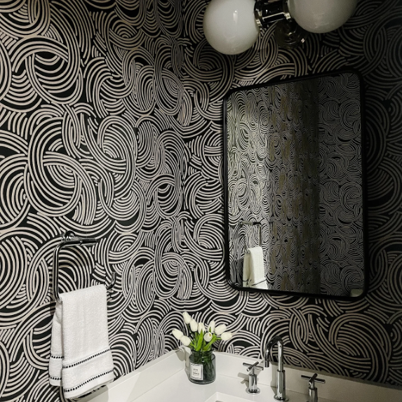 Patterned bathroom wallpaper.